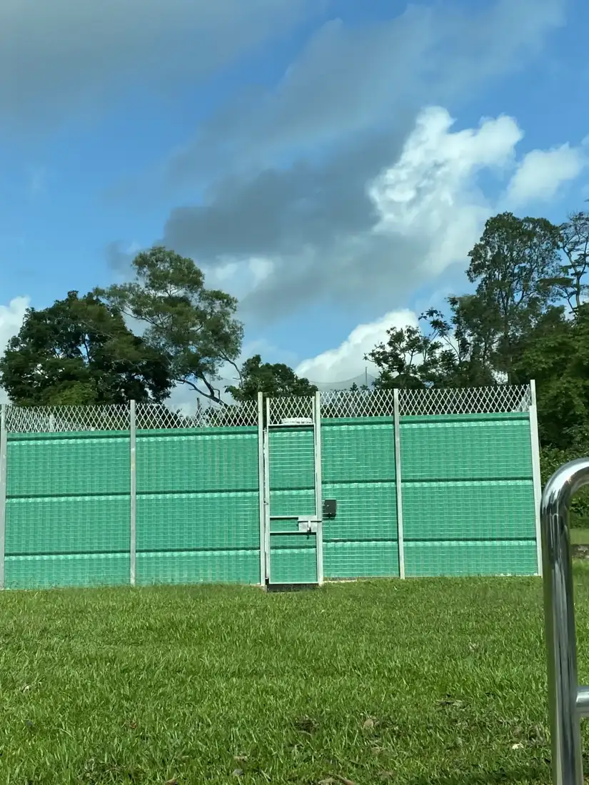 The perimeter: fence, razor mesh and gate